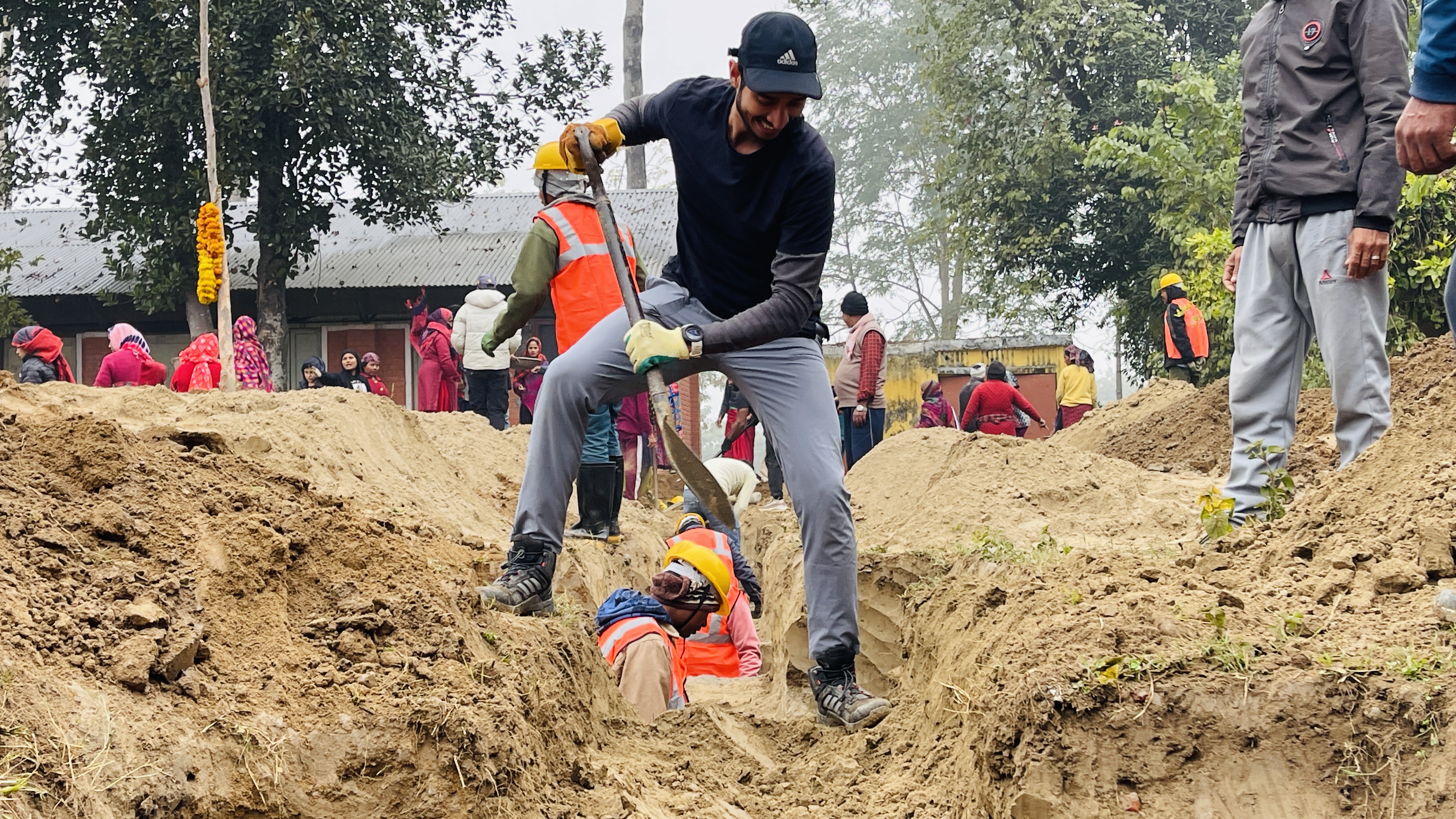Parth digging at the construction site