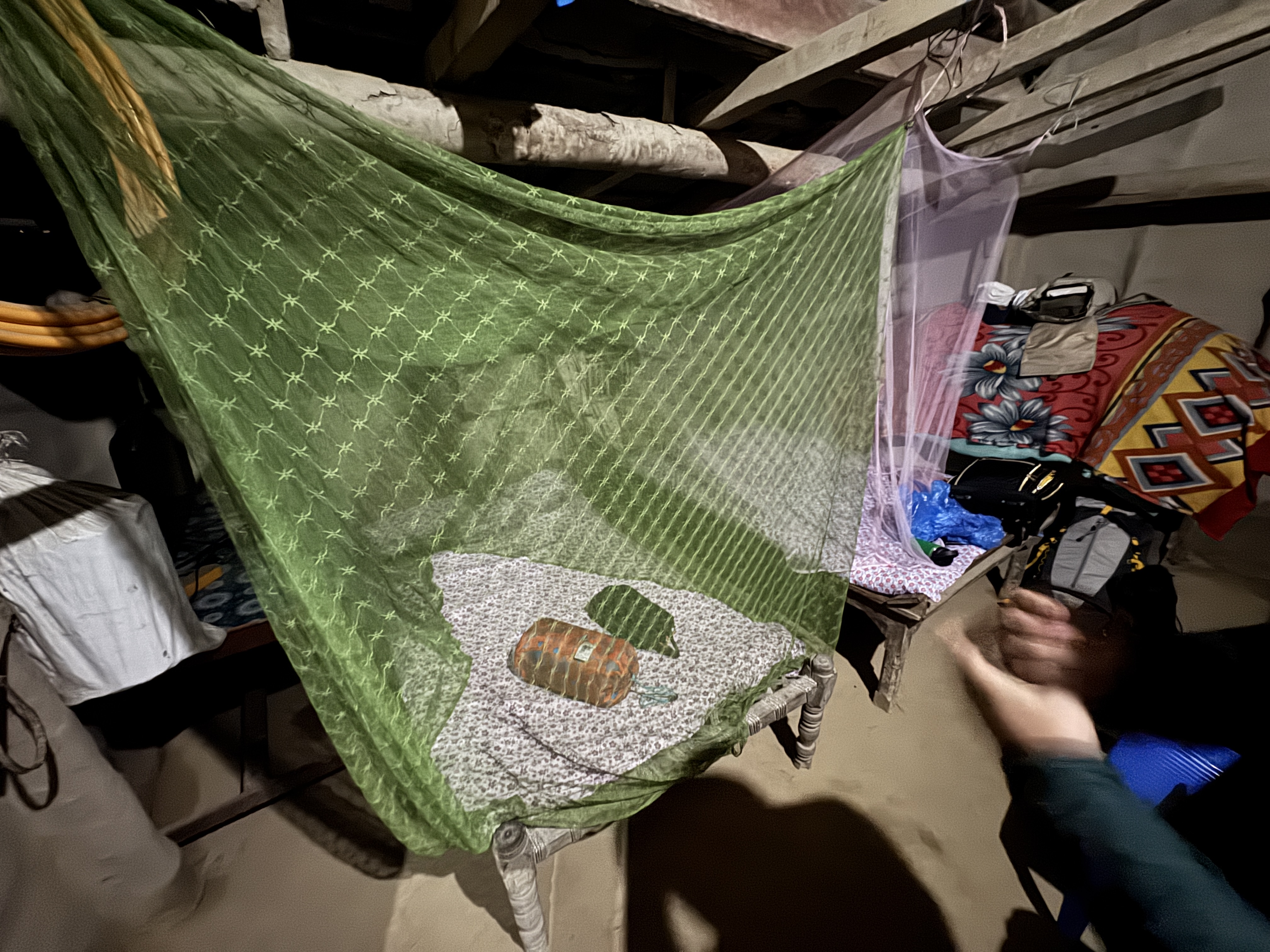 Resting under mosquito nets