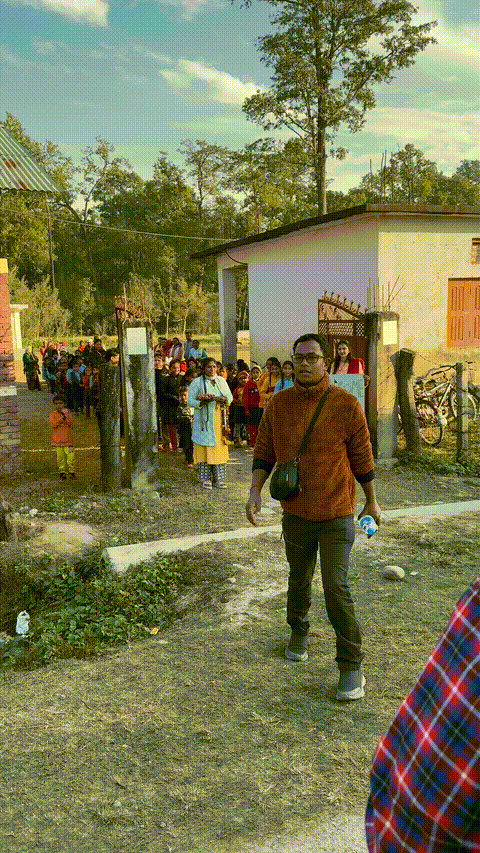 Children welcoming us with garlands